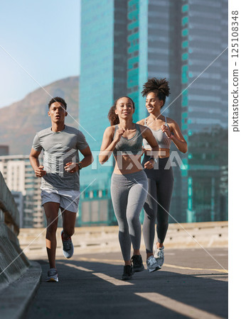 Diversity, fitness friends and running together in city for freedom or healthy lifestyle motivation. Runner athlete, sports training team and wellness coach outdoor workout for cardio exercise goal 125108348