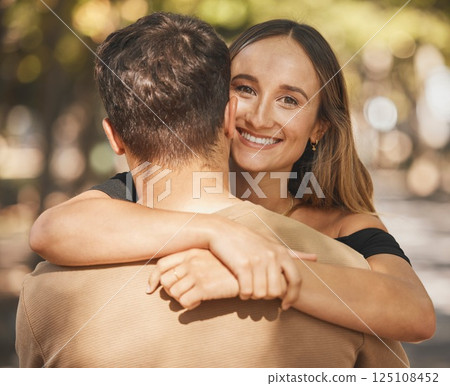 Couple, hug and love with support in a park, smile and happy on outdoor date together in summer. Portrait of trust, happiness and woman with man hugging with affection, care and compassion in nature Couple, hug and love with support in a park, smile and happy on outdoor date together in summer. Portrait of trust, happiness and woman with man hugging with affection, care and compassion in nature 125108452