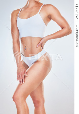 Healthy body goals, woman in studio with white background mockup or fitness motivation for self love. Model girl with clean wellness diet, confident underwear pose in studio or strong body positivity Healthy body goals, woman in studio with white background mockup or fitness motivation for self love. Model girl with clean wellness diet, confident underwear pose in studio or strong body positivity 125108513
