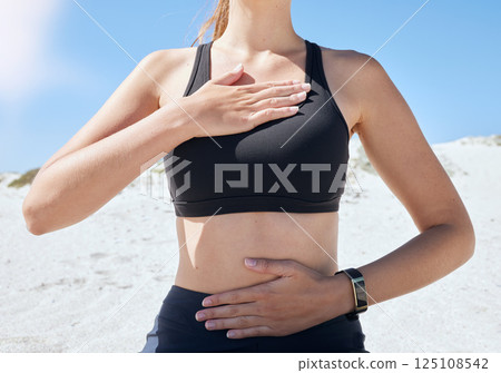 Hands, body and beach with a sports woman outdoor on the sand for health, diet or lifestyle in summer. Nature, fitness and wellness with a female outside on the coast for exercise during the day Hands, body and beach with a sports woman outdoor on the sand for health, diet or lifestyle in summer. Nature, fitness and wellness with a female outside on the coast for exercise during the day 125108542