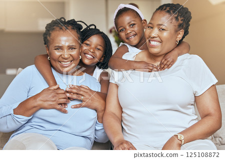 Portrait of black family, mom and children smile with grandma on sofa of modern African living room with love, happiness and bonding together. Quality time, big family hug and people on home vacation Portrait of black family, mom and children smile with grandma on sofa of modern African living room with love, happiness and bonding together. Quality time, big family hug and people on home vacation 125108872