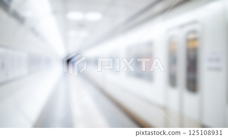 empty subway station metro platform blurred modern corridor bright public transportation indoor white underground minimalist urban contemporary interior clean passenger travel 125108931