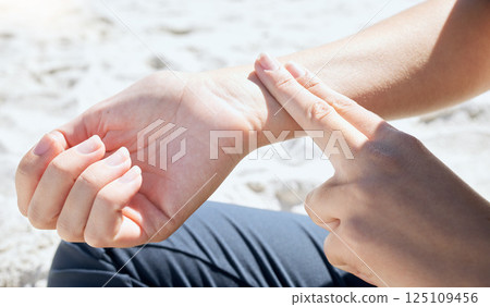Woman, hand and check pulse, heartbeat and wrist with finger outdoor after workout, training or cardio. Person, hands and monitor heart rate after healthy workout or body activity in nature at beach Woman, hand and check pulse, heartbeat and wrist with finger outdoor after workout, training or cardio. Person, hands and monitor heart rate after healthy workout or body activity in nature at beach 125109456