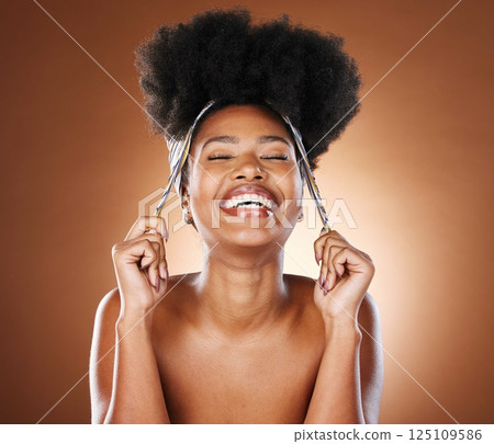 Beauty, hair and afro with black woman and scarf for fashion, luxury and skincare wellness. Smile, health and curly hair with girl model for self love, confidence and empowerment in studio background Beauty, hair and afro with black woman and scarf for fashion, luxury and skincare wellness. Smile, health and curly hair with girl model for self love, confidence and empowerment in studio background 125109586