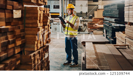 Tablet, stock or man in woodwork workshop for furniture manufacturing, renovation or quality control. Check, builder or carpenter with inspection with timber, remodeling maintenance or research 125109744