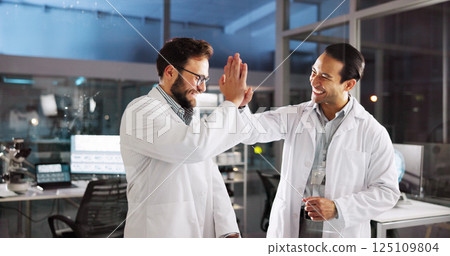 Scientist, men and high five with celebration at laboratory, smile and goals with medical research, cheers and breakthrough. People, partnership and happy with success, innovation and cure for virus Scientist, men and high five with celebration at laboratory, smile and goals with medical research, cheers and breakthrough. People, partnership and happy with success, innovation and cure for virus 125109804