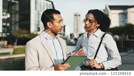 Corporate, people and explaining with tablet in city for planning, engineer team and urban development. Man, woman or talking with digital information, project management and infrastructure expansion Corporate, people and explaining with tablet in city for planning, engineer team and urban development. Man, woman or talking with digital information, project management and infrastructure expansion 125109910