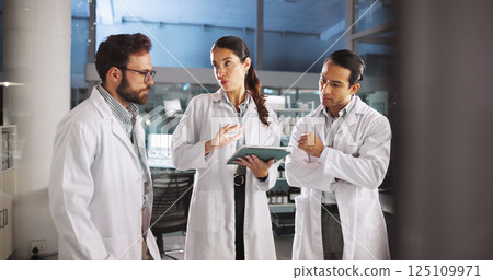 Scientist, talk and meeting on tablet in lab for research, medical investigation and pharmaceutical report. People, explain and digital for planning, biology study and information of vaccine solution Scientist, talk and meeting on tablet in lab for research, medical investigation and pharmaceutical report. People, explain and digital for planning, biology study and information of vaccine solution 125109971