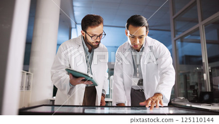 Scientist, men and screen with meeting for data review, medical research or innovation. Computer table, interactive display and clinical analysis for science, study and teamwork or tablet results Scientist, men and screen with meeting for data review, medical research or innovation. Computer table, interactive display and clinical analysis for science, study and teamwork or tablet results 125110144