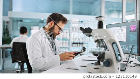 Clipboard, research and science with man in laboratory for clinical trial results, vaccine record and microscope. Healthcare report, medical and virus cure with person in clinic for bacteria sample 125110149