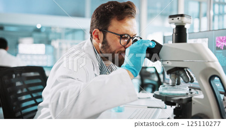 Scientist, man and medical study with microscope at lab with sample, review and glasses for pharma job. Person, gloves and equipment with process for vaccine innovation, trial and clinical research 125110277
