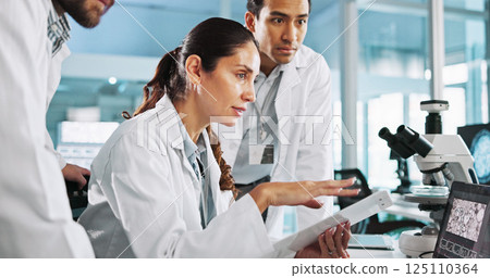 Teamwork, talking or scientists on laptop for medical breakthrough, clinical trial or DNA discovery. People, biology testing or science research in lab with results notes, bacteria or medicine cure Teamwork, talking or scientists on laptop for medical breakthrough, clinical trial or DNA discovery. People, biology testing or science research in lab with results notes, bacteria or medicine cure 125110364