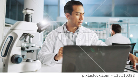 Microscope, science and laptop with man in laboratory for dna sample, forensics investigation and healthcare. Research report, genetic analysis and medical test with person for pathology and clinic 125110388