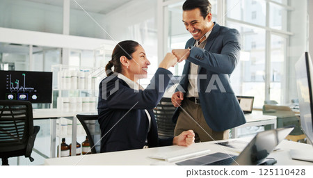 Business people, success and celebration with fist bump at office for neurology study, results or good news. Businessman, woman or employees with smile for medical investment, profit or teamwork Business people, success and celebration with fist bump at office for neurology study, results or good news. Businessman, woman or employees with smile for medical investment, profit or teamwork 125110428