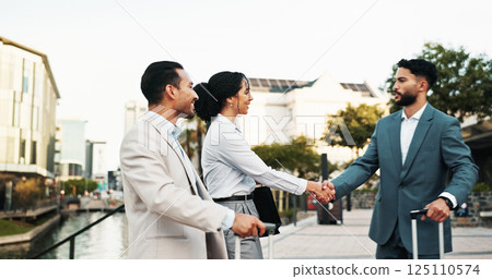 Business people, meeting and career opportunity with handshake for travel, commute or deal in city. Group, employees or team shaking hands with partnership for B2B, negotiation or agreement in town Business people, meeting and career opportunity with handshake for travel, commute or deal in city. Group, employees or team shaking hands with partnership for B2B, negotiation or agreement in town 125110574