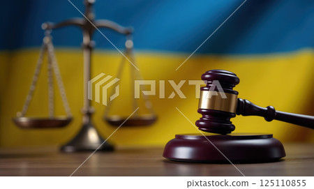 Gavel and justice scales symbolizing law and order in Ukraine 125110855