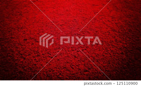 Close-up background of a rug carpet with a striking crimson texture 125110900