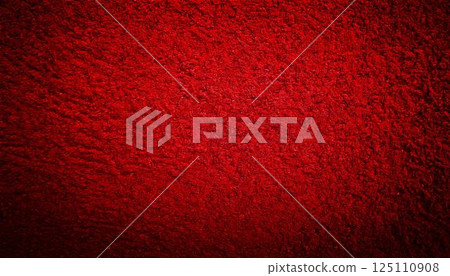 Close-up background of a rug carpet with a striking crimson texture 125110908