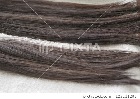 Hair used for hair donation Hair used for hair donation 125111293