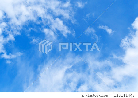 Blue sky with white fluffy cloud. Cumulus clouds background. Cloudscape morning sky. The concepts of freedom of live, never give up and positive though energy. Blue sky with white fluffy cloud. Cumulus clouds background. Cloudscape morning sky. The concepts of freedom of live, never give up and positive though energy. 125111443