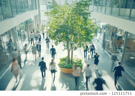 blurred background of walking people at corporate office center blurred background of walking people at corporate office center 125111751