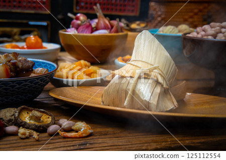 Traditional Taiwanese Zongzi and various ingredients on display 125112554
