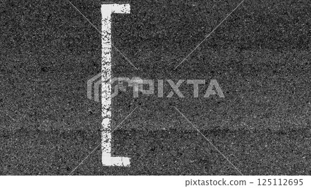 Start or finish line on car race, Start and finish line racing, Grid start race track, Top view textured and background grid start on the asphalt road race track abstract. Start or finish line on car race, Start and finish line racing, Grid start race track, Top view textured and background grid start on the asphalt road race track abstract. 125112695