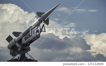 Single missile on a launcher - 3D illustration Single missile on a launcher - 3D illustration 125112699