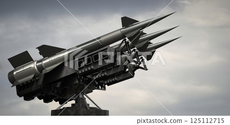 Three missiles on a launcher - 3D illustration Three missiles on a launcher - 3D illustration 125112715