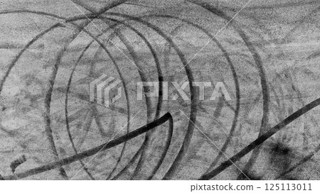 Car tire mark from car skid mark, Car tire on asphalt road race track, Texture and background car wheel tire mark on asphalt road. Car tire mark from car skid mark, Car tire on asphalt road race track, Texture and background car wheel tire mark on asphalt road. 125113011