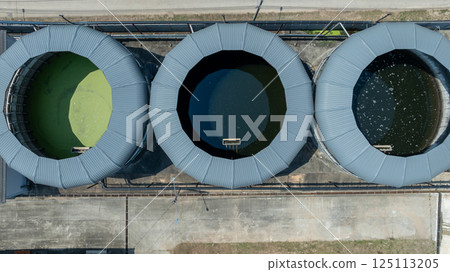 Aerial view blackwater treatment tank with waste water, Circle circular water clarifier cleaning water, Circle water treatment plant circular clarifier. 125113205