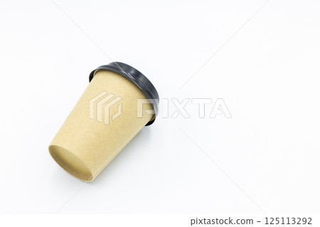 Brown paper coffee cup with black lid on white background, Brown paper cup blank coffee cup for takeaway on white background, Brown empty paper cup for coffee eco coffee cafe. Brown paper coffee cup with black lid on white background, Brown paper cup blank coffee cup for takeaway on white background, Brown empty paper cup for coffee eco coffee cafe. 125113292