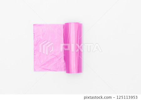 Roll of pink plastic garbage bags on white background, Pink color garbage bags roll, Roll of pink plastic garbage bags on white background. Roll of pink plastic garbage bags on white background, Pink color garbage bags roll, Roll of pink plastic garbage bags on white background. 125113953