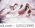 White stylish wedding shoes for bride. Close-up 125113995