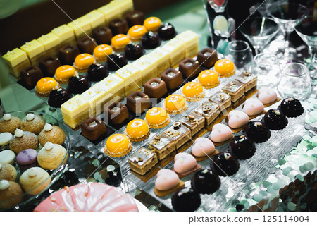 Buffet with a variety of delicious sweets, food ideas, celebration Buffet with a variety of delicious sweets, food ideas, celebration 125114004