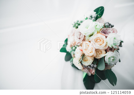 Wonderful luxury wedding bouquet of different flowers Wonderful luxury wedding bouquet of different flowers 125114059