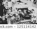 Golden crown lying on the table in church 125114142