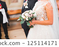 Wedding couple bide and groom get married in a church 125114171