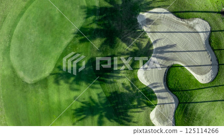 Top view golf course with lush greens, green fairway and sand bunker, Golf course green grass and trees fairway and putting green, Beautiful golf course. 125114266