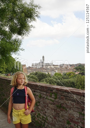 Scenic View of Historic City with teen girl in Foreground Scenic View of Historic City with teen girl in Foreground 125114567