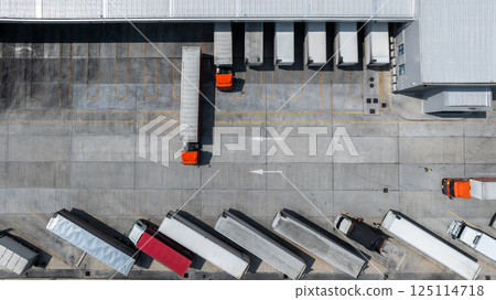 Aerial top view semi truck cargo trailer at logistic park warehouse goods, Distribution warehouse shipping supply chain, Business transportation logistic freight shipping cargo by semi truck cargo 125114718