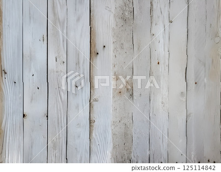 A close-up shot of a beat-up, old wooden fence made of vertical planks with visible grain and knots. The wood is a weathered grayish-white, giving off a rustic, aged vibe. The planks are evenly spaced A close-up shot of a beat-up, old wooden fence made of vertical planks with visible grain and knots. The wood is a weathered grayish-white, giving off a rustic, aged vibe. The planks are evenly spaced 125114842