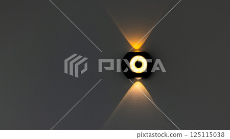 The illumination will go to the wall, Spotlight illuminating orange color warm light textured gray concrete wall, Spot light background, Wall with light shining texture and background. The illumination will go to the wall, Spotlight illuminating orange color warm light textured gray concrete wall, Spot light background, Wall with light shining texture and background. 125115038