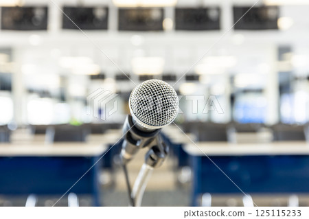 Microphone for press conference speaker report interview in press room, Microphone on stand in conference room, Public announcement event, Organization company meeting, live performance media. Microphone for press conference speaker report interview in press room, Microphone on stand in conference room, Public announcement event, Organization company meeting, live performance media. 125115233