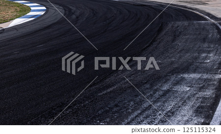 Car tire mark on race track, Abstract black car tire mark on race track, Abstract texture background car tire mark skid mark on asphalt circuit, Tire track on road race speed track circuit. 125115324