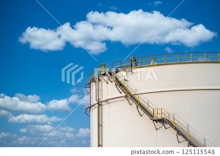 Oil and Gas storage tank with blue sky background at oil and gas refinery industrial zone, Business industrial factory oil and gas refinery plant, Oil refinery petrochemical plant factory storage tank 125115548