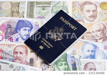 American passport on Georgian money 125116408