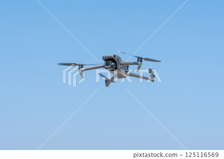 Drone flying 125116569