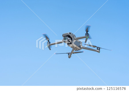 Drone flying 125116576