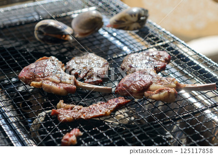 Lamb chops, clams, barbecue, herbs Lamb chops, clams, barbecue, herbs 125117858